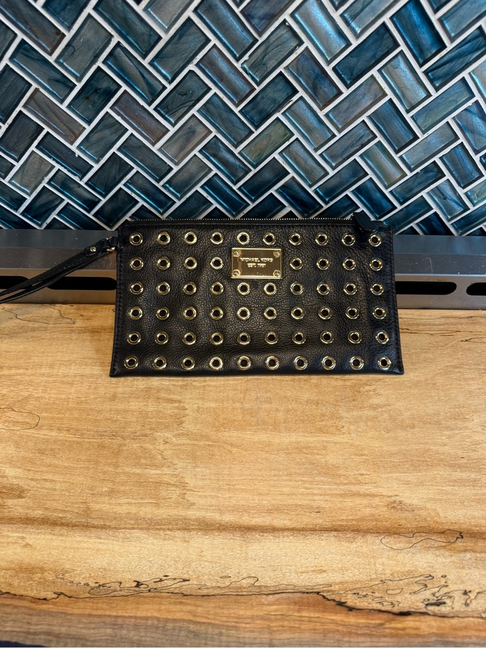 Michael Kors Black Wristlet Clutch with Gold Grommet Detail